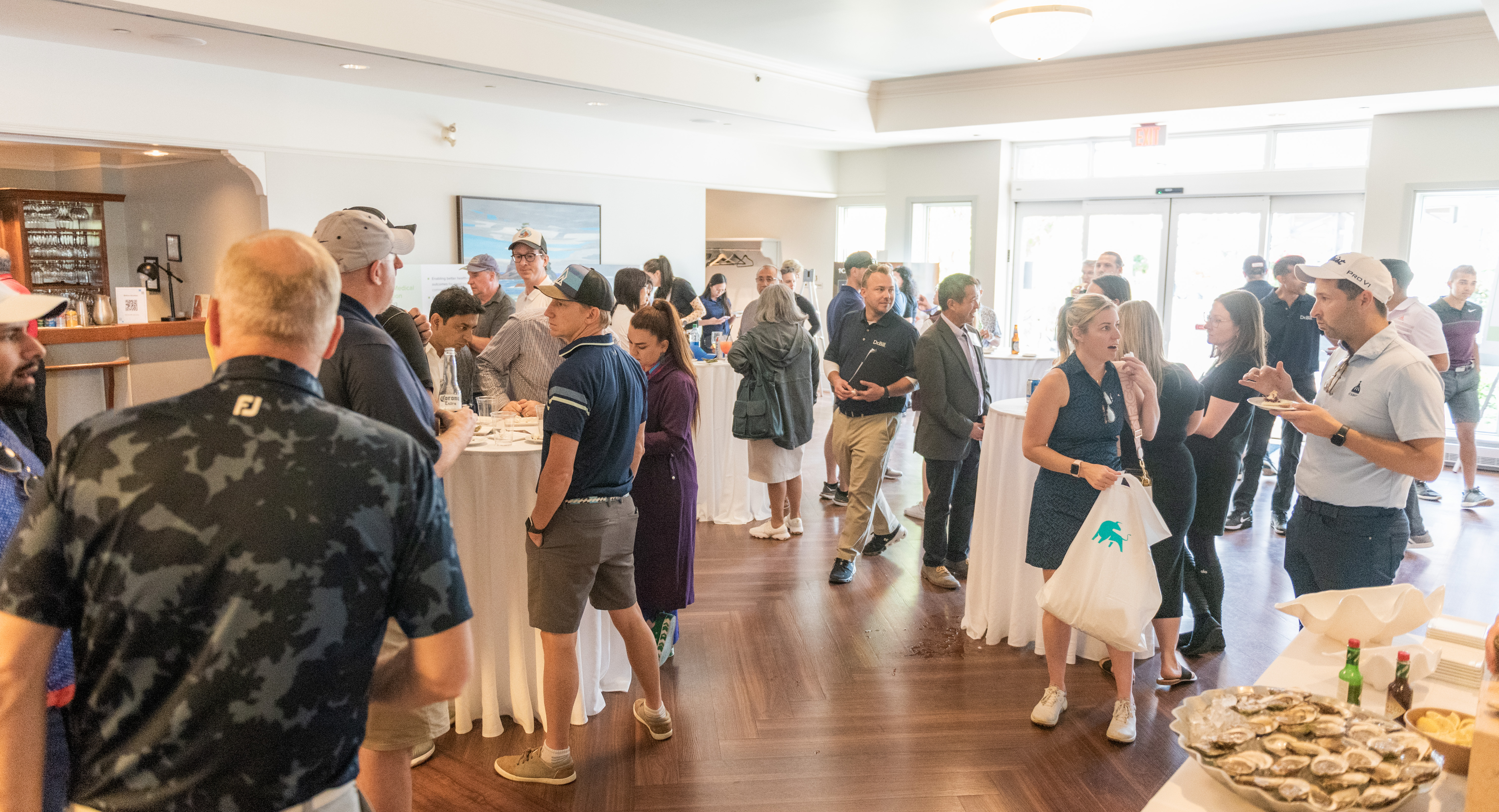 Guests of the OMF 2023 Golf Tournament are seen during the pre-luncheon gathering at Angus Glen.